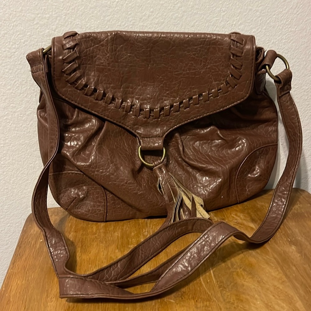 Stylish brown hobo bag with cute brown tassel. Unknown brand.